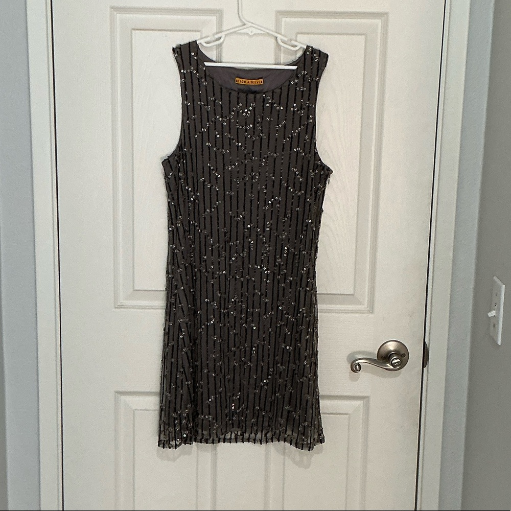 Alice + Olivia size 4 I believe size tag removed Elegant Black Sleeveless Dress